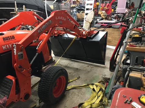 bent loader arms repair